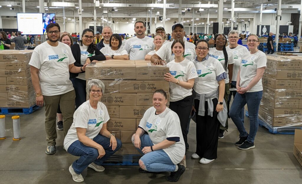 T4C volunteers helped pack food at during Food Banks Canada's annual After the Bell event