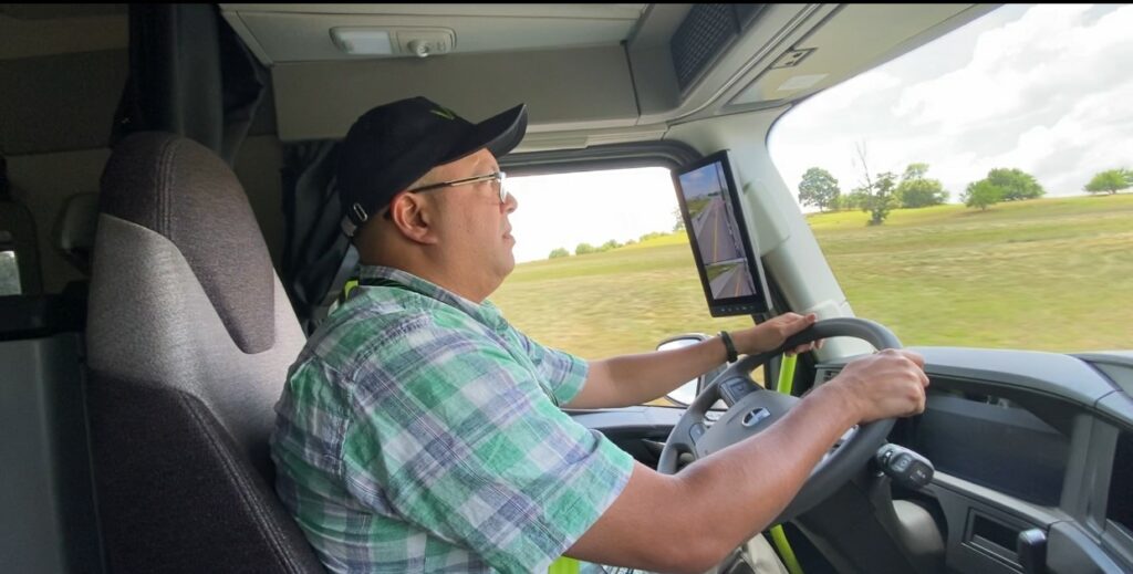 Leo Barros driving a truck