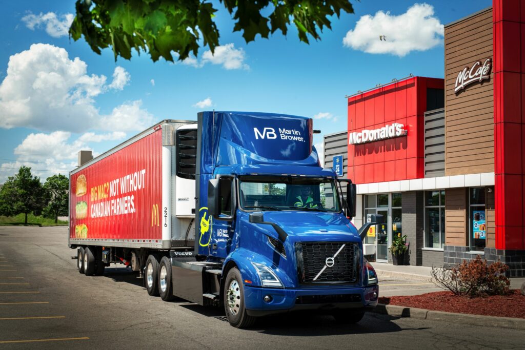 Picture of Martin Bower's Volvo VNR Electric truck parked outside a McDonald's restaurant