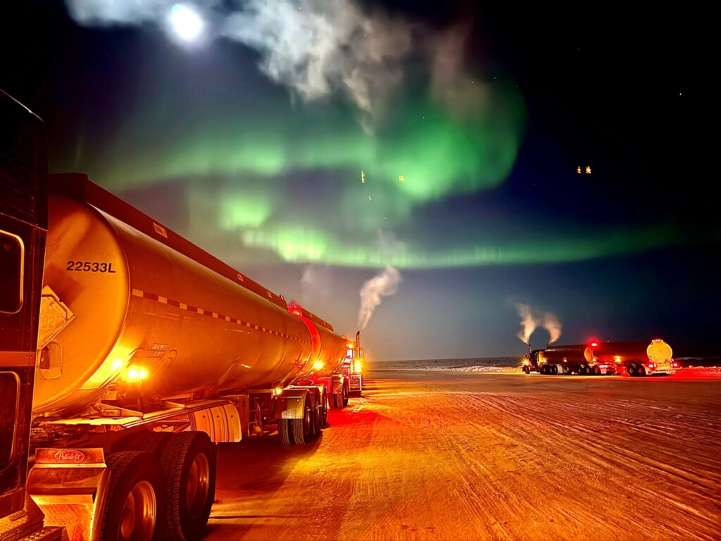 Trucks and northern lights