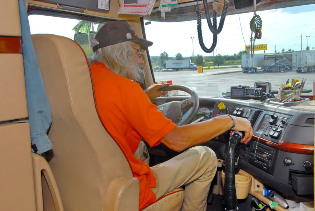 Driver navigates truck stop parking lot